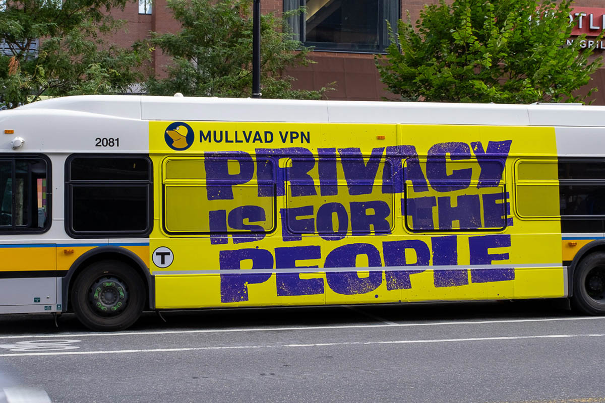 Yellow city bus with a Mullvad VPN advertisement reading: Mullvad VPN, Privacy is for the people.