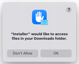A system notification, saying that the installer wants to access the Downloads folder.
